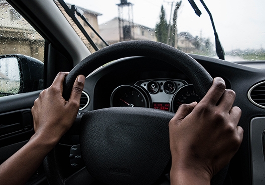 hands on steering wheel
