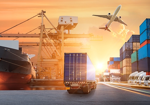 different modes of transport on a dock and a plane flying overhead