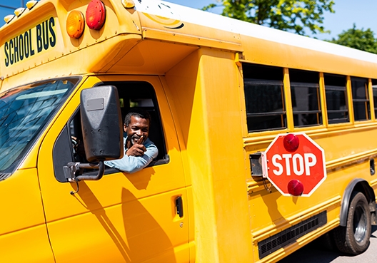 A bus driver in a school bus