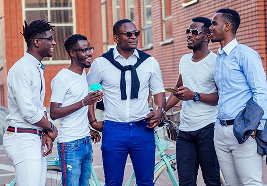 A group of young guys talking